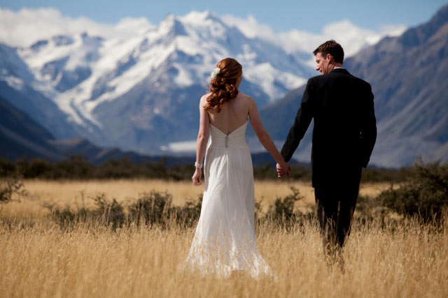 Bride and groom with mountain background